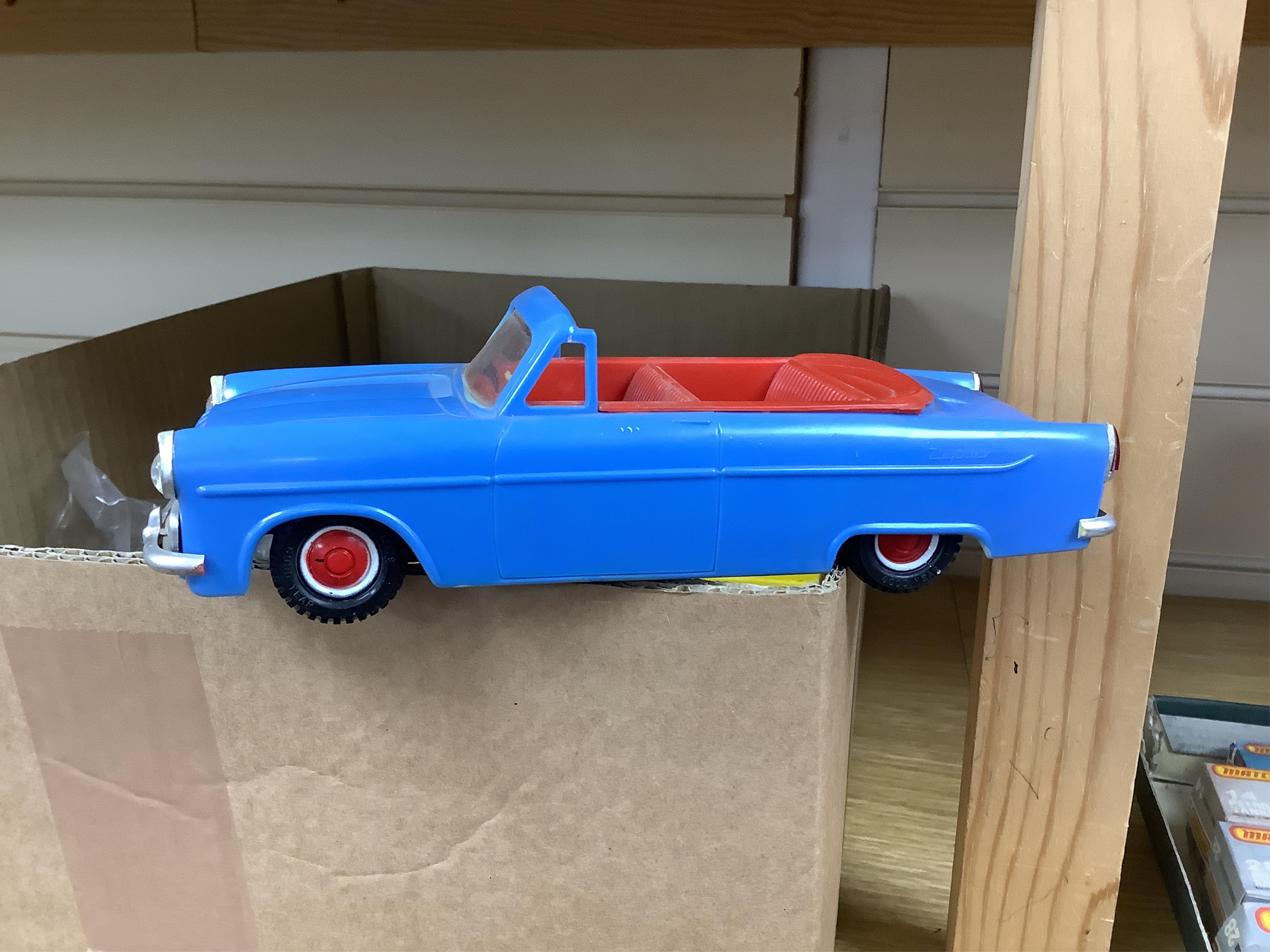 A quantity of diecast vehicles and a few useful boxes including; a boxed Clifford Series Ford Zephyr convertible, two boxed Replicar series Ford Zephyr convertibles, ten unboxed Dinky Toys, two Scalextric Formula One car